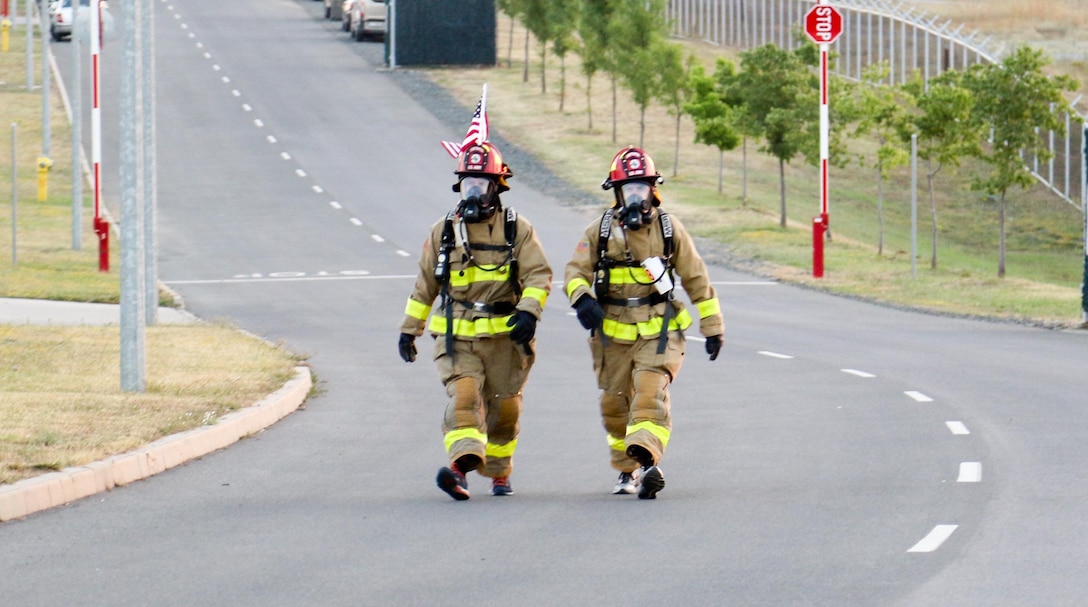 Sgt. Alek Davis (l) and Sgt. Curtis Carlin of the 487th Engineering Detachment (Firefighters), US Army Reserve, Fort Des Moines, Iowa, participate in a 5K run at Novo Selo Training Area, Bulgaria on July 21, 2017. The 487th Engineering Detachment is in the last two months of their near year-long deployment to provide fire protection as well as medical evacuation assistance to the base aid station.  (US Army photo by Master Sgt. JD Phippen)