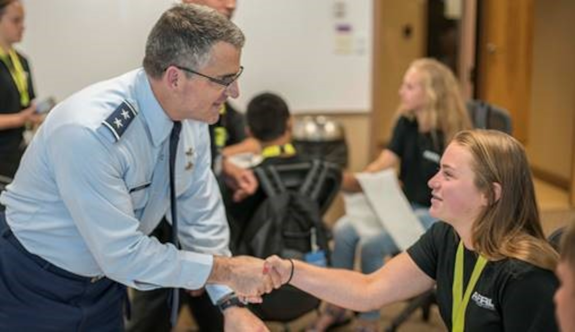 AFRL Commander Maj. Gen. William Cooley visits students at the Leadership, Experience, Growing Apprenticeships Committed to Youth Master Craftsman camp July 19, 2017. LEGACY is a new program created to spark student interest in science, technology, engineering and math and in turn become part of the Air Force workforce. (U.S. Air Force photo/ Kwame Acheampong)