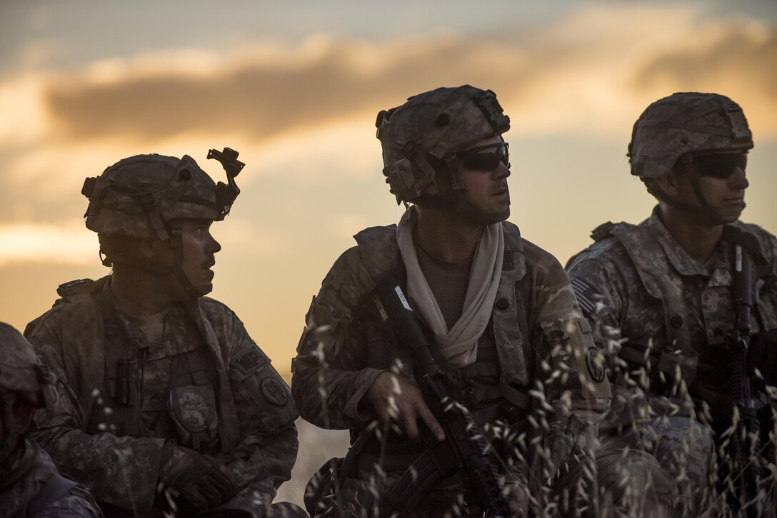 U.S. Army Reserve military police Soldiers from the 56th Military Police Company, the 382nd Military Police Battalion and the 344th Military Police Company, conduct a leader reconnaissance the night before a morning mission during a Combat Support Training Exercise (CSTX) at Fort Hunter Liggett, California, July 22, 2017. (U.S. Army Reserve photo by Master Sgt. Michel Sauret)