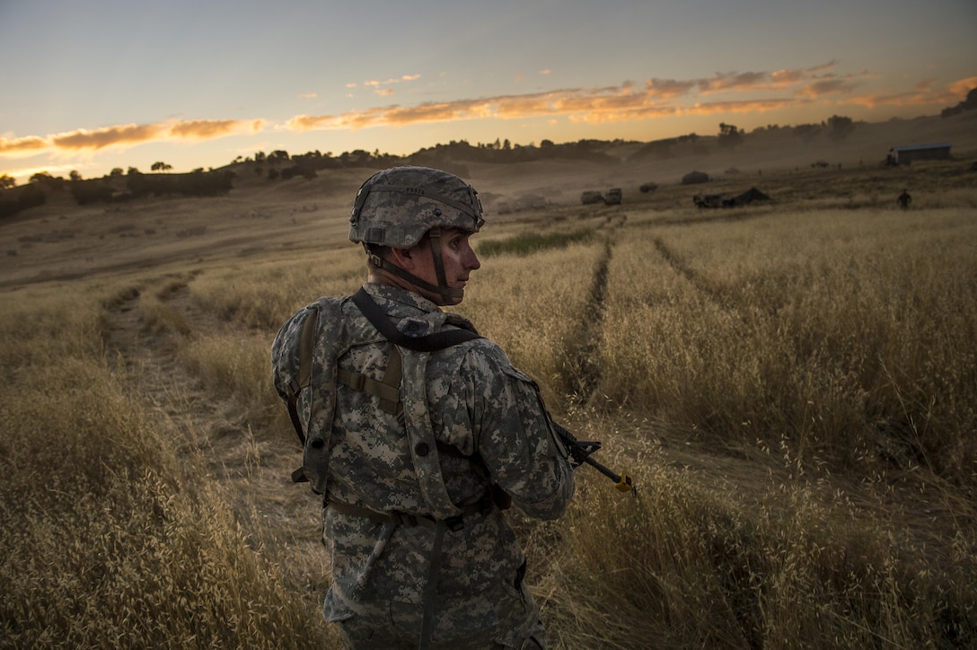 Sgt. Jay Villa, a U.S. Army Reserve military police with the 56th Military Police Company, of Phoenix, Arizona, returns to camp after a reconnaissance patrol with his troops the night before a morning mission during a Combat Support Training Exercise (CSTX) at Fort Hunter Liggett, California, July 22, 2017. (U.S. Army Reserve photo by Master Sgt. Michel Sauret)