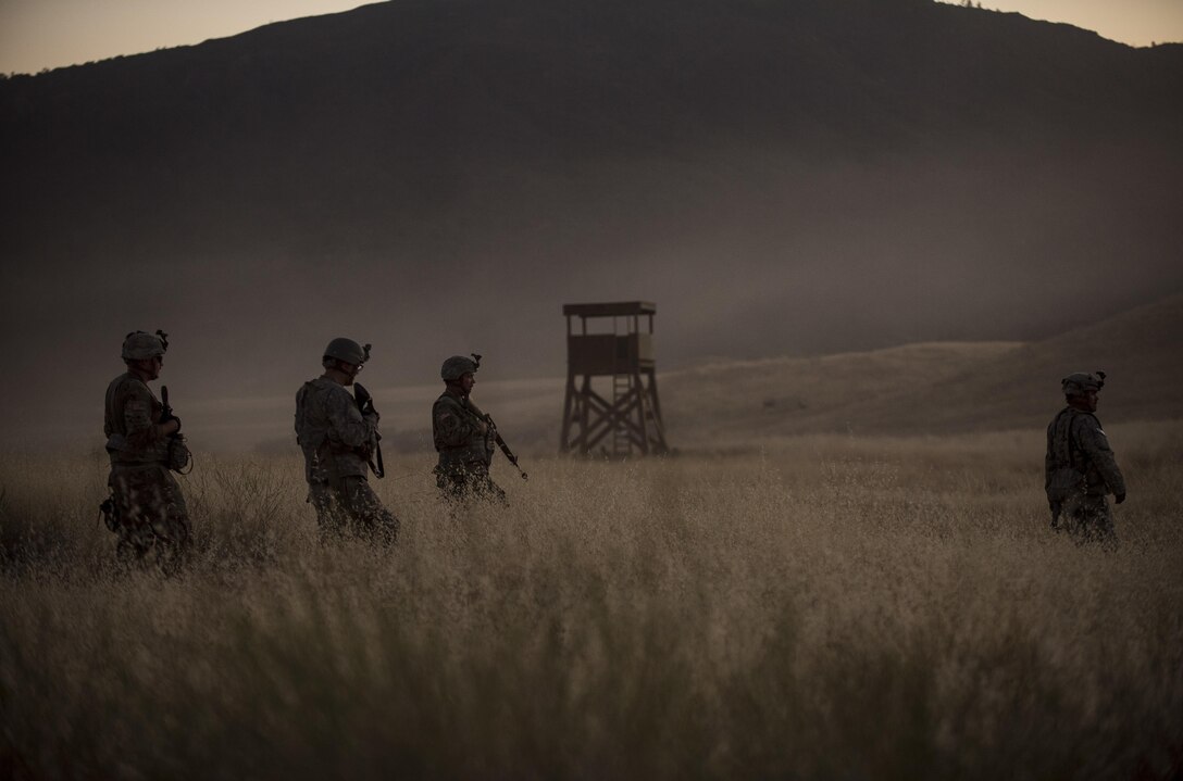 U.S. Army Reserve military police Soldiers from the 56th Military Police Company, of Mesa, Arizona, return from a reconnaissance patrol the night before a morning mission during a Combat Support Training Exercise (CSTX) at Fort Hunter Liggett, California, July 22, 2017. (U.S. Army Reserve photo by Master Sgt. Michel Sauret)