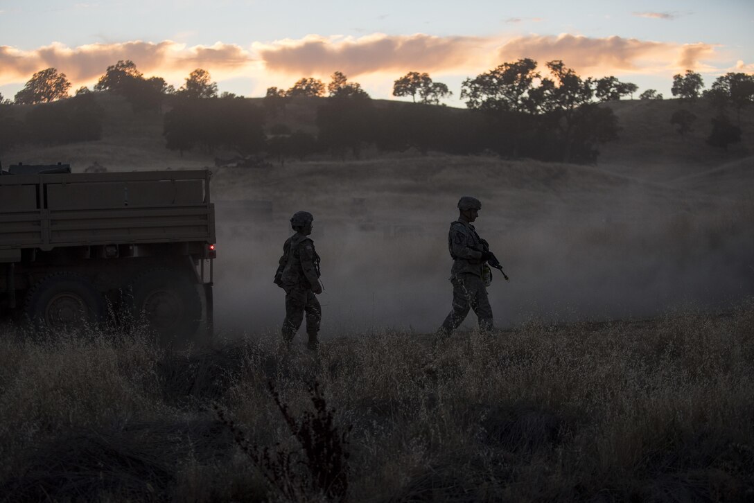 U.S. Army Reserve military police Soldiers from the 56th Military Police Company, of Mesa, Arizona, return from a reconnaissance patrol the night before a morning mission during a Combat Support Training Exercise (CSTX) at Fort Hunter Liggett, California, July 22, 2017. (U.S. Army Reserve photo by Master Sgt. Michel Sauret)