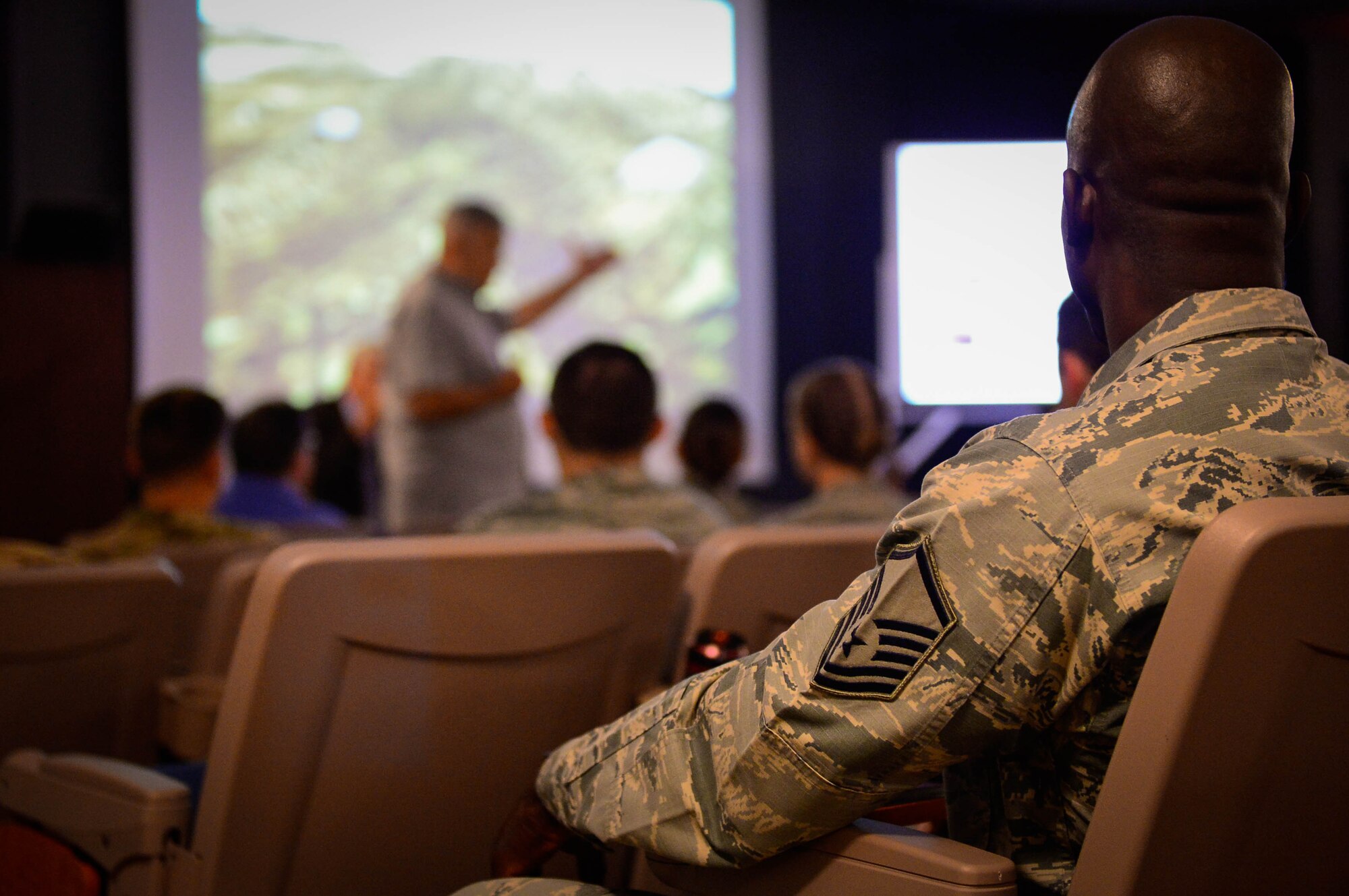 Airmen from Cannon Air Force Base, New Mexico, participate in a virtual staff ride July 12 and 13, 2017, at the 16th Special Operations Squadron auditorium.  The event was a form of professional development partially used to better understand previously used military tactics and strategies. (U.S. Air Force Photo by Staff Sgt. Charles Dickens/Released)