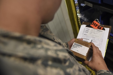 Airman 1st Class Michael Bixler, 628th Logistics Readiness Squadron Materiel Management Flight aircraft parts store technician, acquires an aircraft part for a C-17 Globemaster III in need of maintenance in the ACPS building on Joint Base Charleston, S.C., July 14. ACPS will receive their parts and equipment from 635th Supply Chain Operations Group at Scott Air force Base, IL, which will then be processed by ACPS members and inventoried in their warehouse. Members of the 437th Aircraft Maintenance Squadron will request and pick up needed parts from ACPS when an aircraft needs repairs.