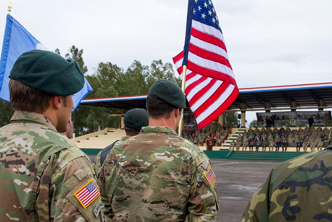 Members of the U.S. special operations team participate in the opening ceremony of Fuerzas Comando 2017 in Mariano Roque Alonso, Paraguay, July 17, 2017. The soldiers are Army Green Berets assigned to 7th Special Forces Group, from Eglin Air Force Base, Florida, and are one of 20 multinational special operations teams from the Caribbean, Central and South America and the U.S. competing for the title of Fuerzas Comando champion. Army photo by Staff Sgt. Osvaldo Equite