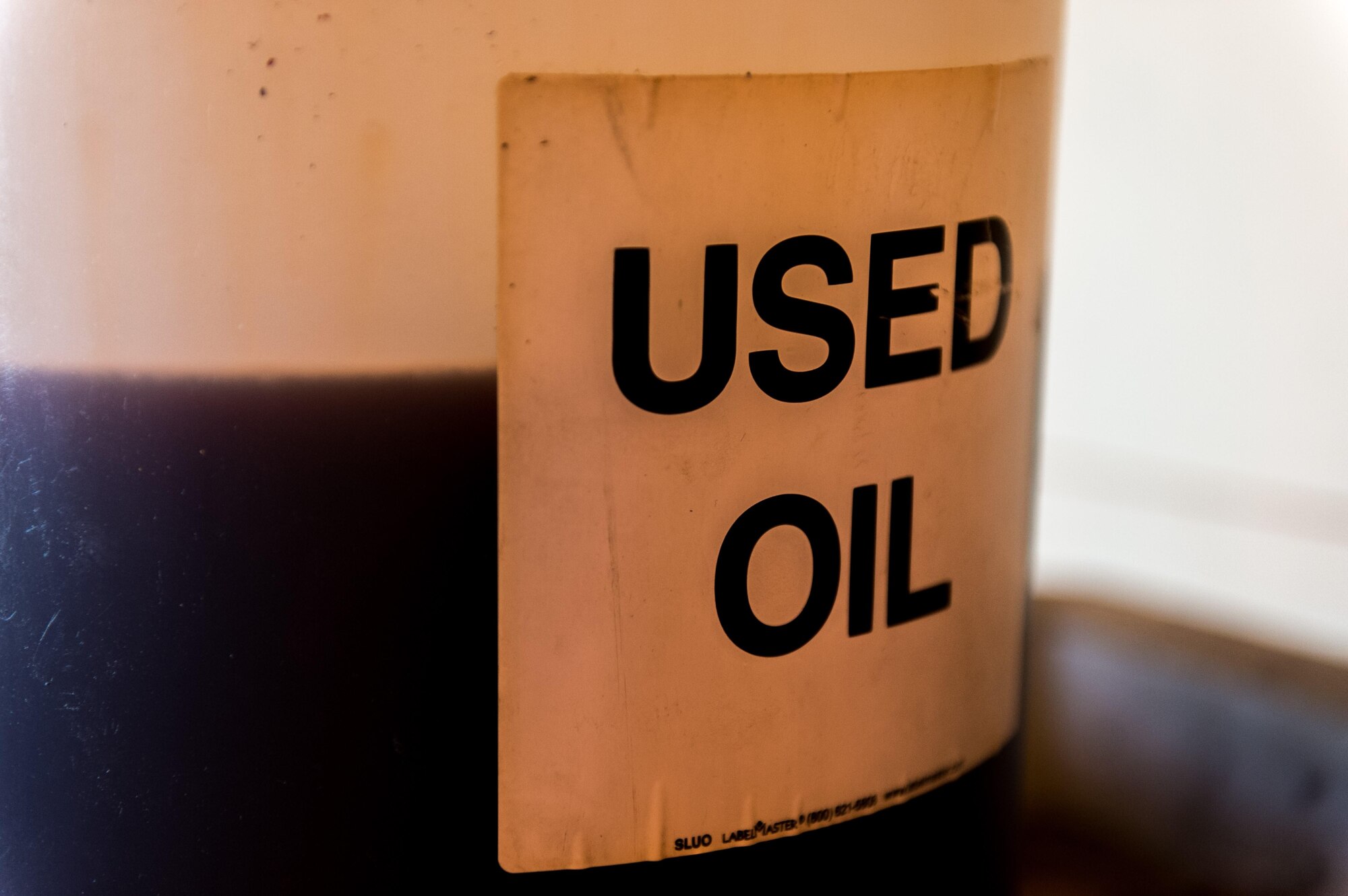 One aspect of the industrial recycling program at Cannon Air Force Base, N.M. involves recycling used engine oil. By recycling the used oil, Cannon AFB saves more than $300,000 annually in hazardous waste removal. (U.S. Air Force Photo by Staff Sgt. Charles Dickens/Released)