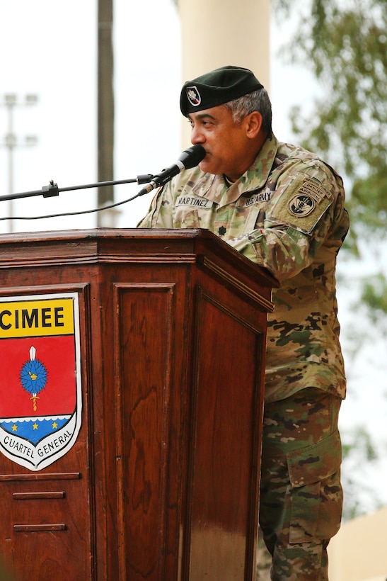 Army Lt. Col. Angel Martinez, Special Operation Command South's Training and Exercise deputy director, speaks to Fuerzas Comando 2017 participants at the opening ceremony at The Institute of Army Education in Mariano Roque Alonso, Paraguay, July 17, 2017. Army photo by Staff Sgt. Chad Menegay