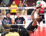Army veteran Staff Sgt. Charles Hightower sets a ball during the sitting volleyball gold medal round of the 2017 Dept. of Defense Warrior Games at the United Center in Chicago July 7.