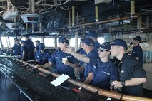 HEALY’s bridge team prepares to moor the ship at Pier 19 in Honolulu, HI