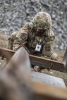 U.S. Army Reserve Soldier, Staff Sgt. Matthew Chisholm, Waycross, Ga., 381st Engineer Company, helps prepare movement of construction materials during Resolute Castle 17 at Cincu, Romania, July 15, 2017. Chisholm, who works in Law Enforcement traveled from his home in Way Cross, Ga., with his unit to help complete construction of a new training facility that will provide Allied forces the opportunity to prepare for potential conflict. The entire operation is led by U.S. Army Reserve engineers, who moved Soldiers and equipment from the U.S. to Romania over a period of several weeks to complete the training facility. Resolute Castle improves interoperability, enhances confidence and security assurance between partner nations, while improving infrastructure, capability and capacity at select locations throughout Europe. (U.S. Army Reserve photo by Staff Sgt. Felix R. Fimbres)