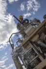 Cpl. George Hawkins, Clinton, Tenn., 733rd Engineer Company, Chattanooga, Tenn., turns off the water to his hose, after cleaning construction equipment, part of routine maintenance, during Resolute Castle 17, at Cincu, Romania, July 15, 2017. Hawkins, a Manager at Advance Auto Parts, traveled from his home in Clinton, Tenn., with his unit to help complete construction of a new training facility that will provide Allied forces the opportunity to prepare for potential conflict. The entire operation is led by U.S. Army Reserve engineers, who moved Soldiers and equipment from the U.S. to Romania over a period of several weeks to complete the training facility. Resolute Castle improves interoperability, enhances confidence and security assurance between partner nations, while improving infrastructure, capability and capacity at select locations throughout Europe. (U.S. Army Reserve photo by Staff Sgt. Felix R. Fimbres)