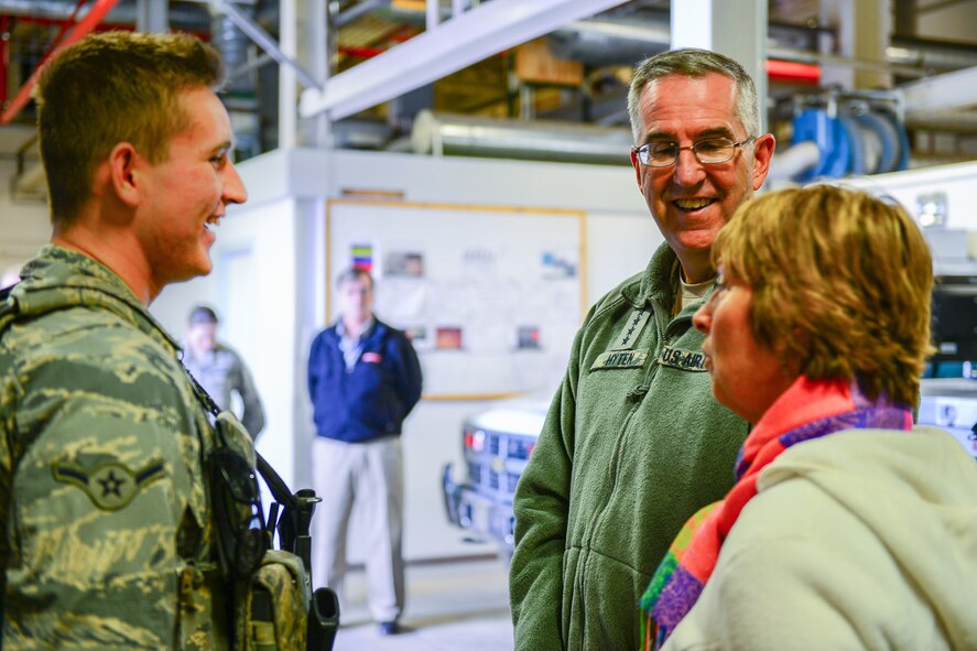 Gen. John Hyten, U.S. Strategic Command commander, and his wife, Laura, meet with Airman Zackery Freiberg, 821st Security Forces Squadron, while at the 12th Space Warning Squadron, July 17, 2017, at Thule Air Base, Greenland. Hyten visited with Airmen during a visit to Thule AB at an all call and lunch at 12th SWS. The 12th SWS operates a Ballistic Missile Early Warning System providing early warning of Intercontinental Ballistic Missile and Sea Launched Ballistic Missile attacks against the U.S. and Canada. (U.S. Air Force photo by Capt. Md Hussain)