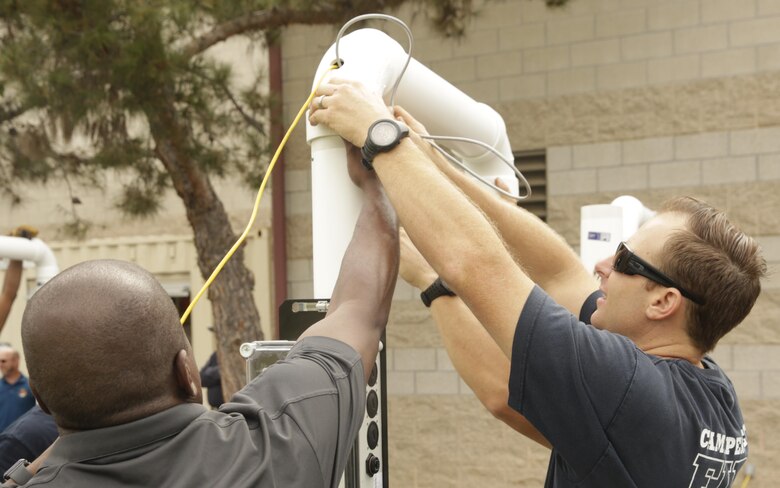 Camp Pendleton firefighters assemble radiation portals for annual training on July 19, 2017. Annual hazardous materials training ensures Camp Pendleton's readiness in case of a HAZMAT emergency. (U.S. Marine Corps photo by LCpl. Lukas Kalinauskas)