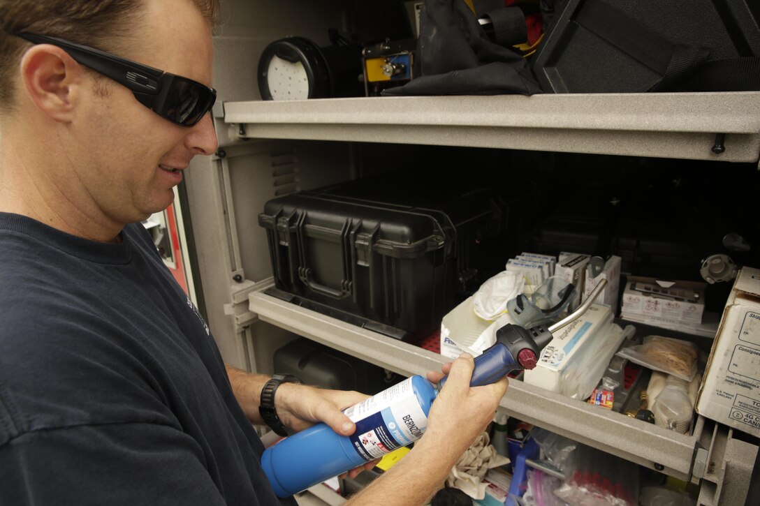 Camp Pendleton firefighter Rusty Duke inventories equipment to ensure the firetrucks are well-equipped in case of an emergency on July 19, 2017. Annual hazardous materials training ensures Camp Pendleton's readiness in case of a HAZMAT emergency. (U.S. Marine Corps photo by LCpl. Lukas Kalinauskas)