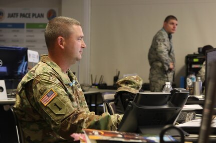 Lt. Col. Larry Boggs, plans and integrations officer for the West Virginia National Guard, monitors operations for the 2017 National Jamboree July 21, 2017, at the Glen Jean Armory in Glen Jean, W. Va. Boggs, who is also a scoutmaster, was a prime planner for the event which draws 30,000 Scouts.

