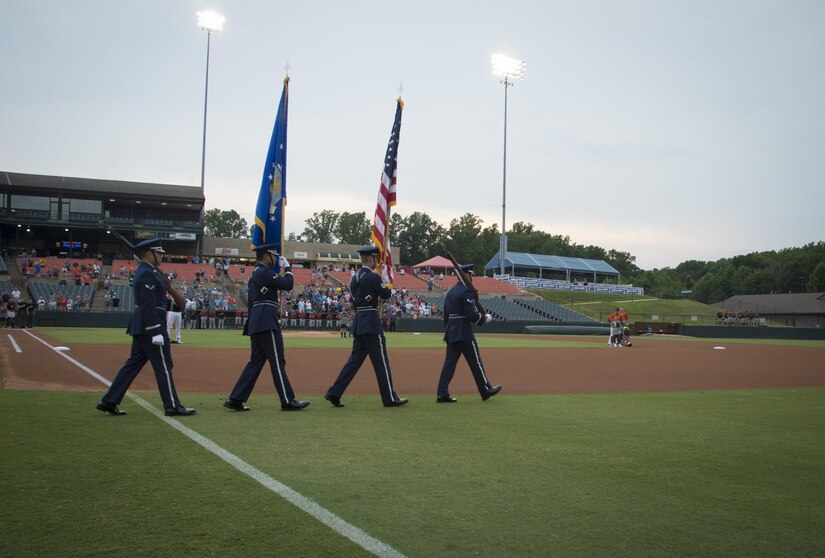 The Joint Base Andrews Honor Guard takes the field to display the colors during Joint Base Andrews Military Appreciation Night hosted by the Bowie Baysox at Prince George’s Stadium, in Bowie, Md., July 21, 2017. Several military members participated in opening ceremonies including the presenting of the colors, singing the national anthem, and throwing out the ceremonial first pitch. (U.S. Air Force photo by Senior Airman Mariah Haddenham)