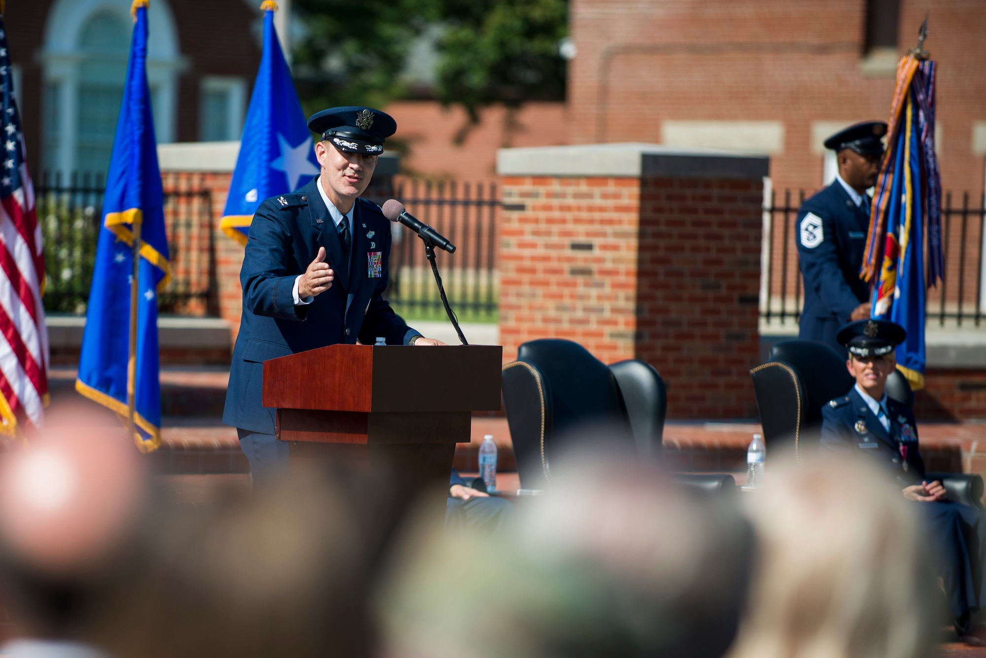 Col. John Howard, 375th Air Mobility Wing commander, speaks during the wing change of command ceremony July 24, 2017, at Scott Air Force Base, Ill. Howard is arriving from Royal Air Force Mildenhall where he served as the vice commander of the 100th Air Refueling Wing. (U.S. Air Force photo by Staff Sgt. Clayton Lenhardt)