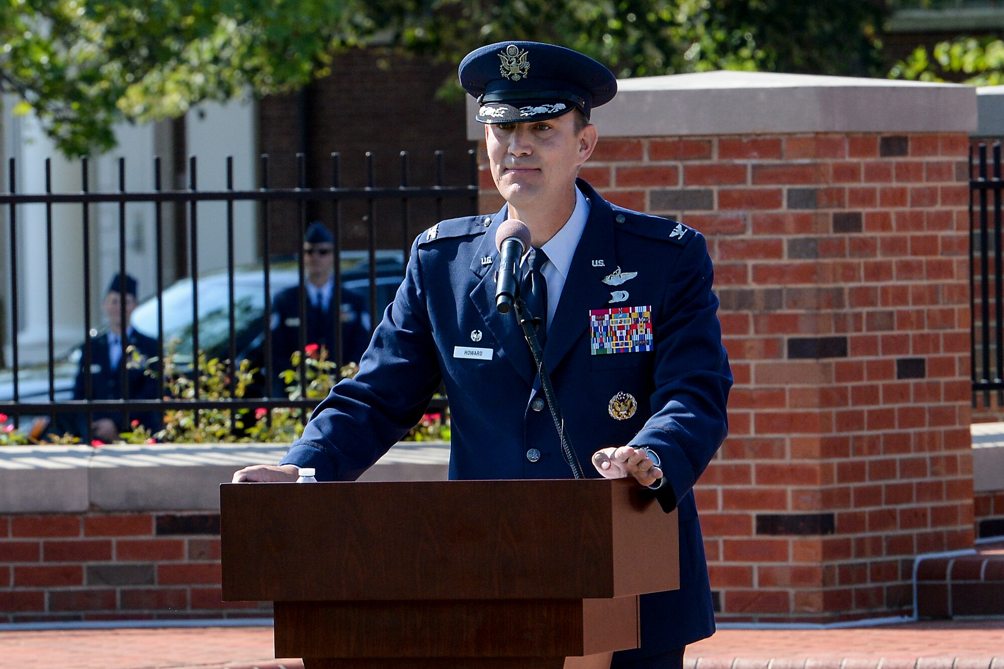 Col. John Howard, 375th Air Mobility Wing commander, gives his first speech as the commander during the 375th AMW change of command ceremony July 24, 2017. Howard thanked those who have helped in throughout his Air Force career and spoke on maintaining the success of the 375th AMW.(U.S. Air Force photo by Airman Chad Gorecki)