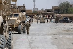 U.S. soldiers deployed in support of Combined Joint Task Force Operation Inherent Resolve and assigned to the 2nd Brigade Combat Team, 82nd Airborne Division, meet up with their Iraqi partners in a recently liberated neighborhood in western Mosul, July 2, 2017. Army photo by Staff Sgt. Jason Hull