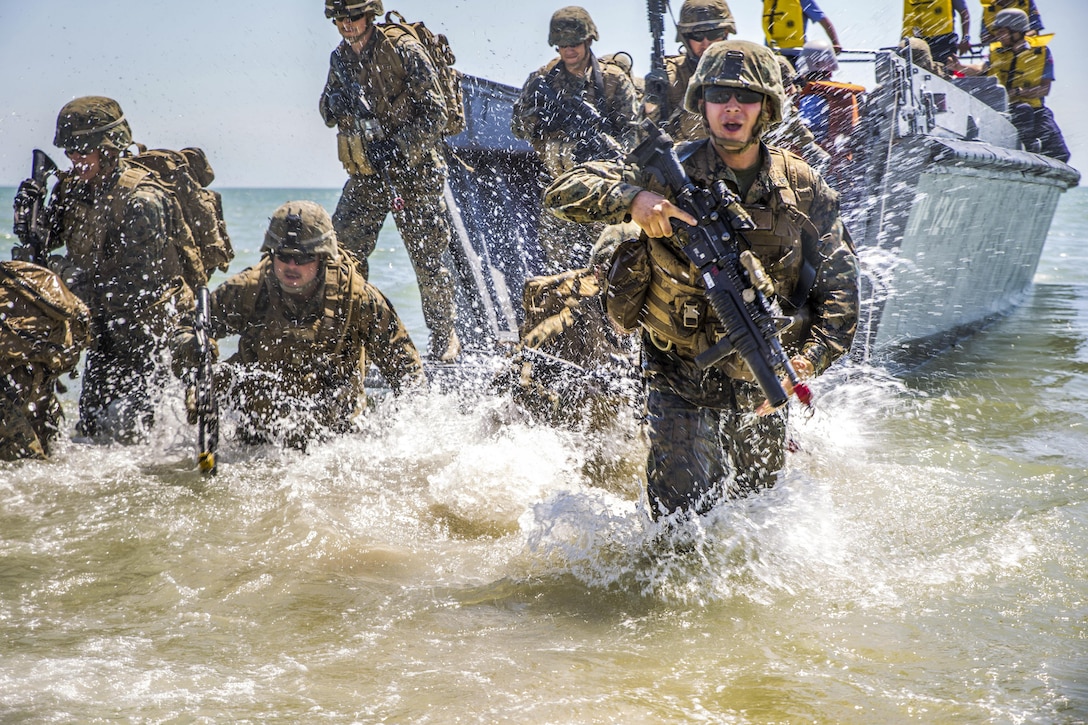 Marines assault a beach using a landing boat from the Turkish ship TCG Karamurselbey during Sea Breeze 2017, an exercise in Mykolayivka, Ukraine, July 19, 2017. Marine Corps photo by Staff Sgt. Marcin Platek

