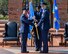 Lt. Gen. Giovanni Tuck, 18th Air Force commander, presents the 375th Air Mobility Wing guidon to Col. John Howard, signifying the start of his command of the wing during a change of command ceremony July 24, 2017 at Scott Air Force Base, Ill. Howard arrived from Royal Air Force Mildenhall, England, where he served as the vice commander for the 100th Air Refueling Wing. (U.S. Air Force photo by Airman Chad Gorecki)