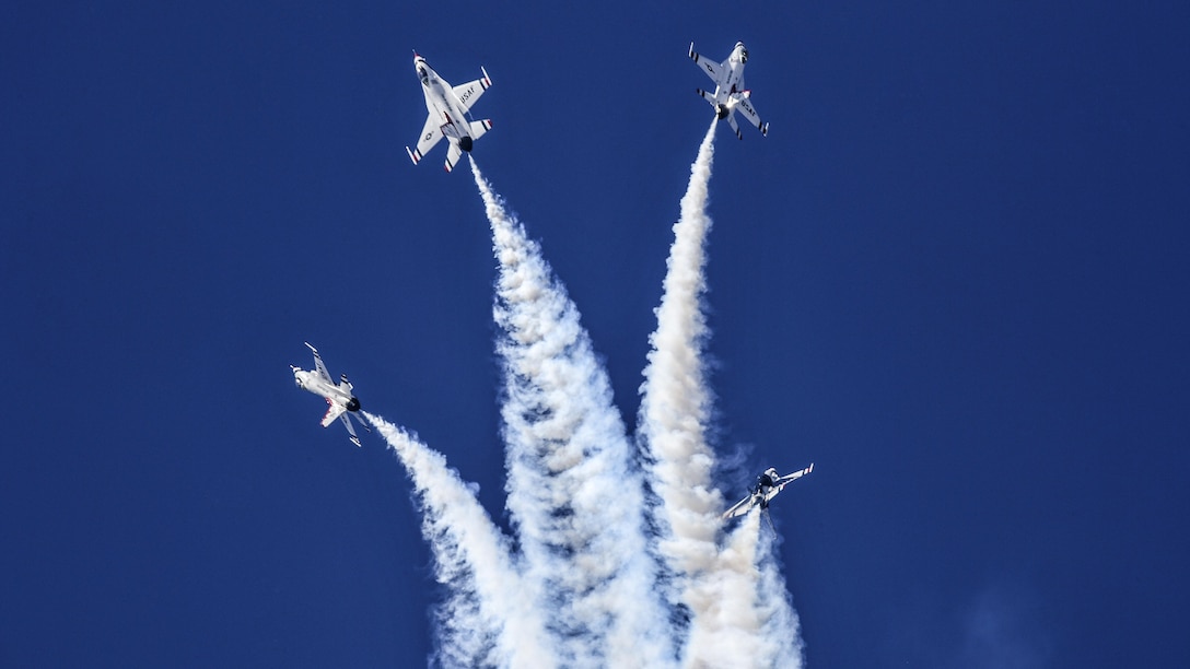 The Thunderbirds, the Air Force's aerial demonstration team, perform precision flying during an air show commemorating the Air Force's 70th anniversary at Great Falls, Nev., July 21, 2017. Air National Guard photo by Staff Sgt. Nieko Carzis
