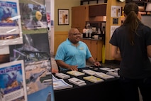 John Swindell, 96th Test Wing’s Operation Security manager, provides enterprise security information and social media guidance to the base community during the OPSEC Roadshow at Eglin Air Force Base, Fla. July 20. The purpose of the OPSEC booth is to educate the base public on the protection of critical and sensitive information. For more information please call 882-5056 (U.S. Air Force photo/Ilka Cole) 