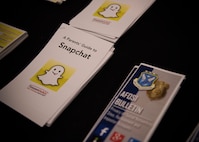 A stack of social media information flyers sit at the Operation Security booth at Eglin Air Force Base, Fla. July 20. The purpose of the flyers was to educate base families about how to safely connect on-line while protecting sensitive and personally identifiable information. (U.S. Air Force photo/Ilka Cole)