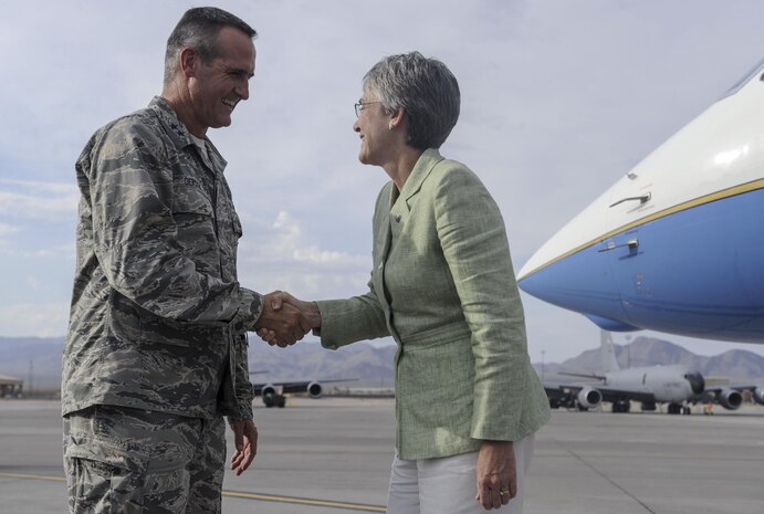 Maj. Gen. Peter Gersten, United States Air Force Warfare Center commander, greets Heather Wilson, Secretary of the Air Force, as she arrives on Nellis Air Force Base, Nevada, July 17, 2017. Wilson discussed her priorities of readiness and innovation during her week in southern Nevada. (U.S. Air Force photo by Senior Airman Kevin Tanenbaum)