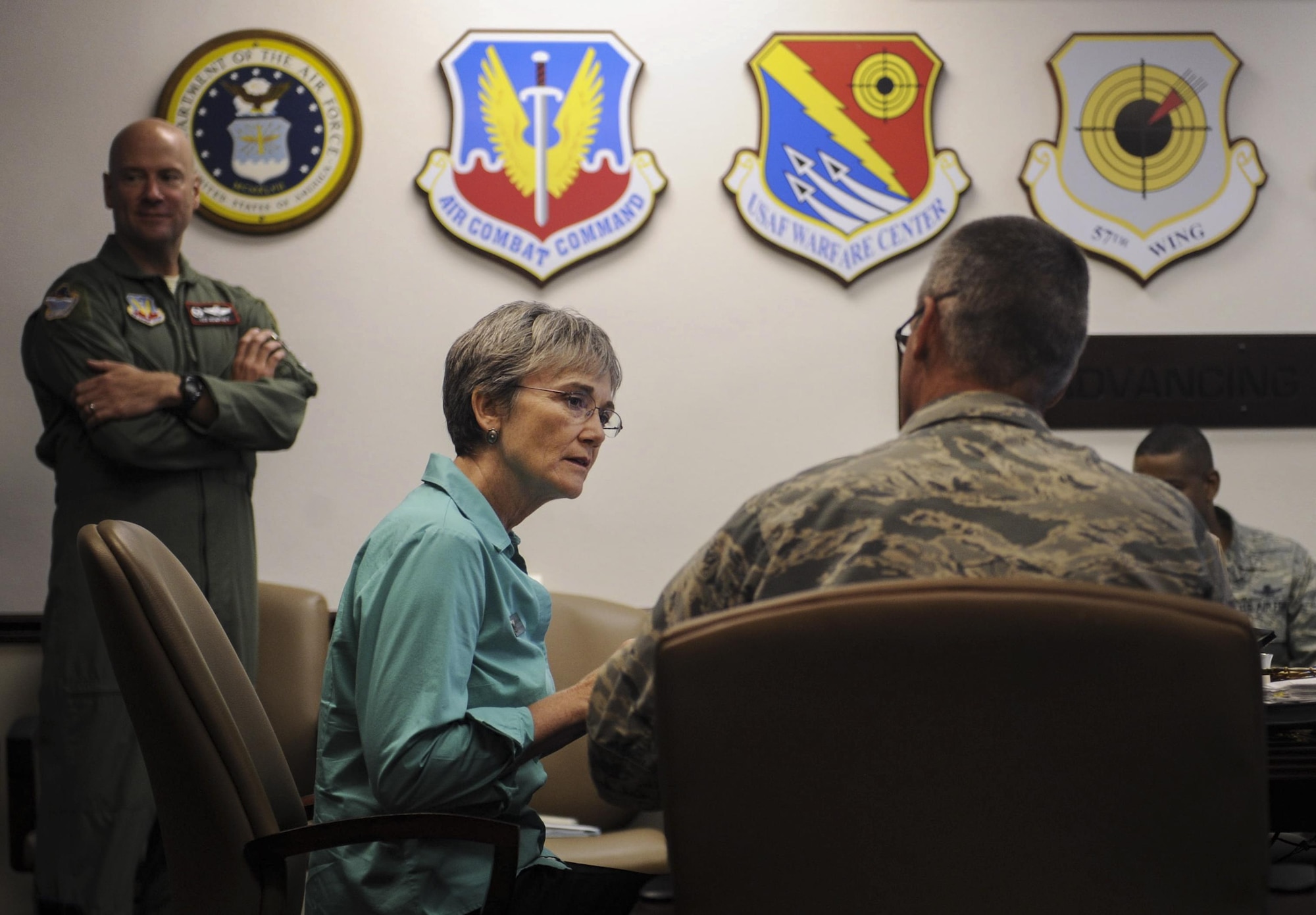 Air Force Secretary Heather Wilson speaks with Maj. Gen. Peter Gersten, United States Air Force Warfare Center commander, during a break at the USAFWC at Nellis Air Force Base, Nevada, July 18, 2017. Wilson saw firsthand how Nellis is at the forefront of modernization. (U.S. Air Force photo by Senior Airman Kevin Tanenbaum)