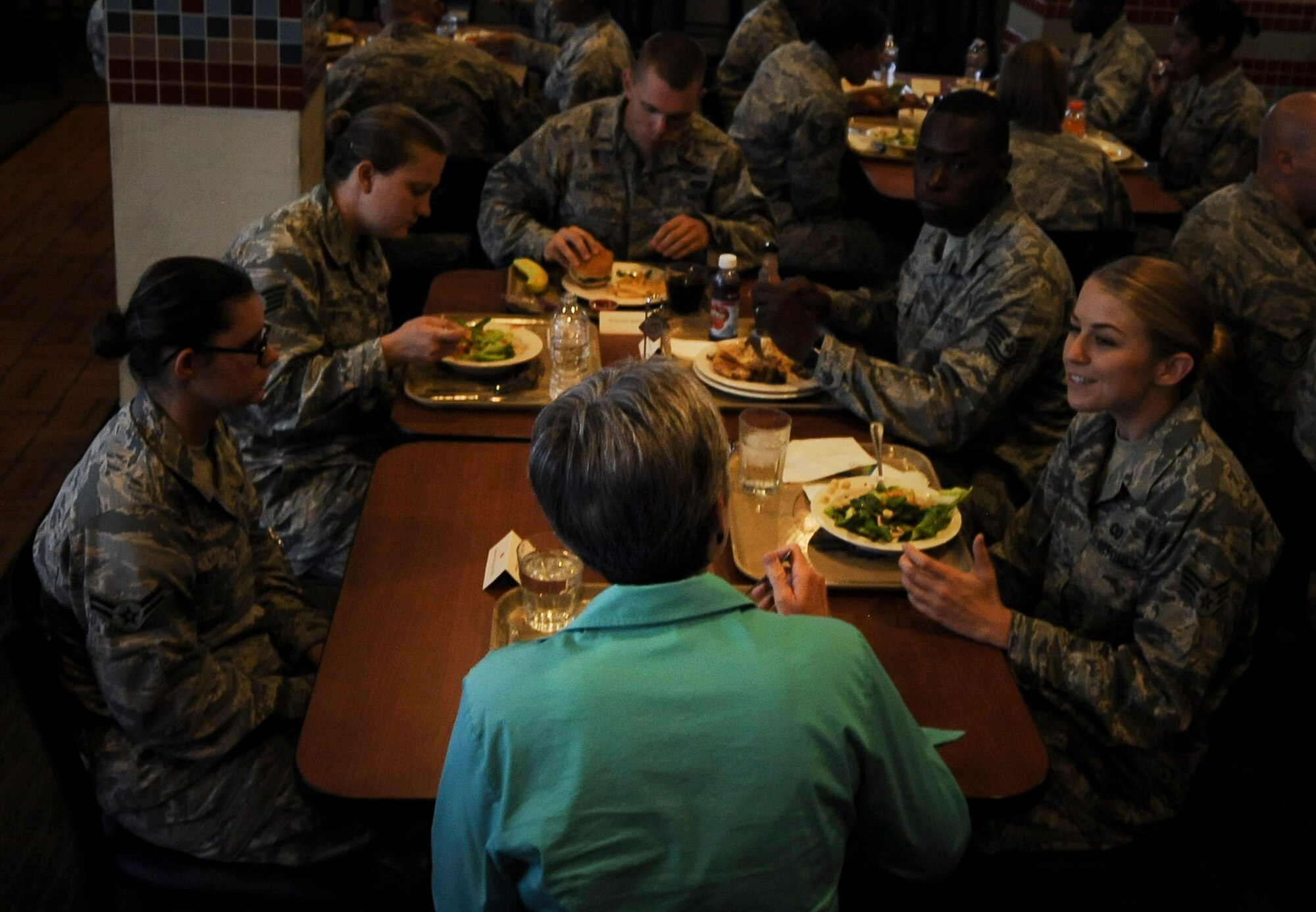 Secretary of the Air Force Heather Wilson shares a lunch with Airmen at the Crosswinds Dining Facility at Nellis Air Force Base, Nevada, July 18, 2017. Wilson visited Nellis and Creech Air Force bases July 17 to 21 and learned more about their operational experiences. (U.S. Air Force photo by Senior Airman Kevin Tanenbaum)