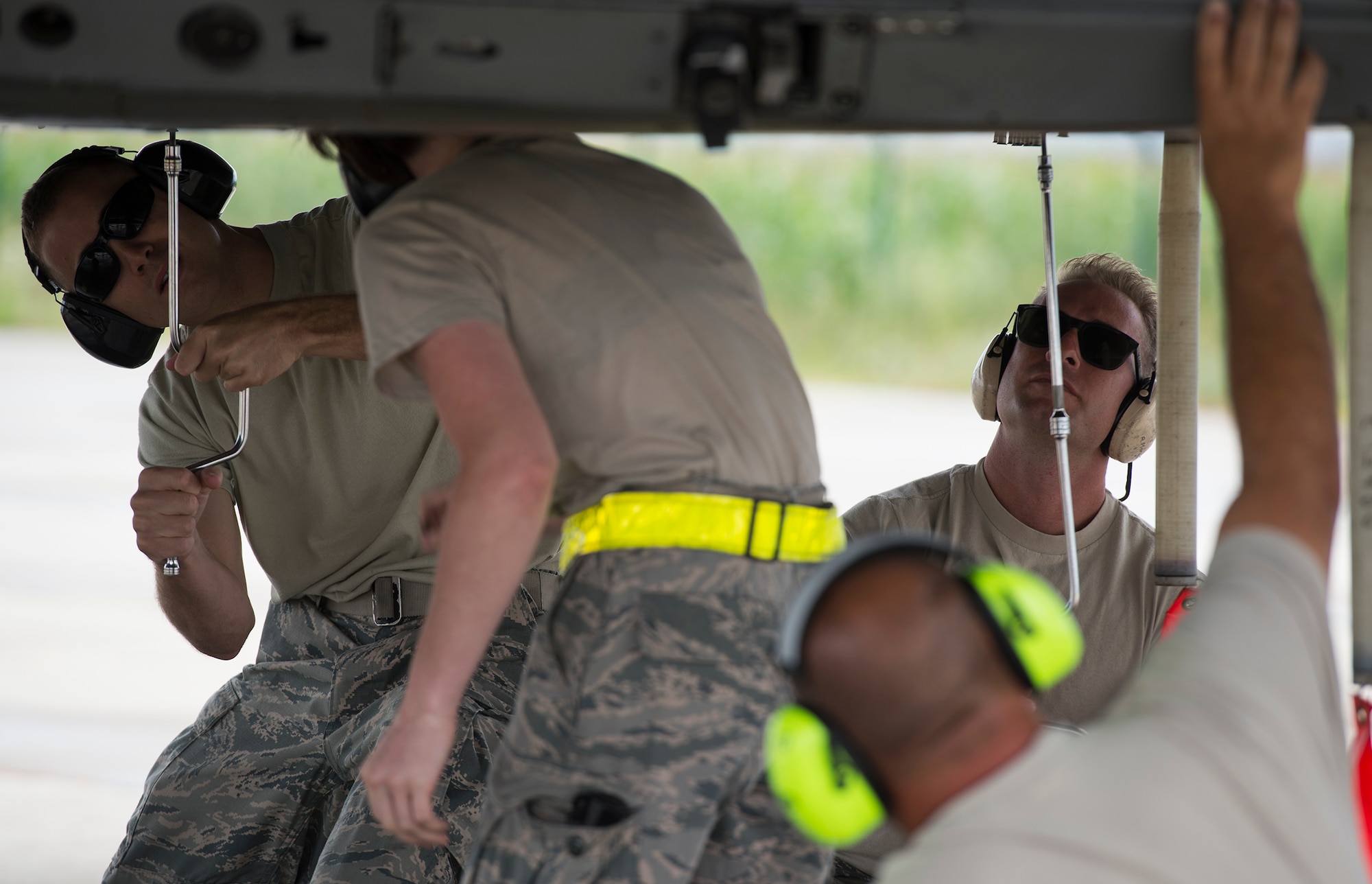 Maintenance Airmen from the 159th Expeditionary Fighter Squadron work on an F-15C Eagle fighter aircraft at Campia Turzii, Romania, July 12, 2017. The squadron is in Romania in support of Operation Atlantic Resolve, an ongoing operation meant to enhance the security of Europe and bolster partnership between NATO allies. (U.S. Air Force photo by Tech. Sgt. Chad Warren)