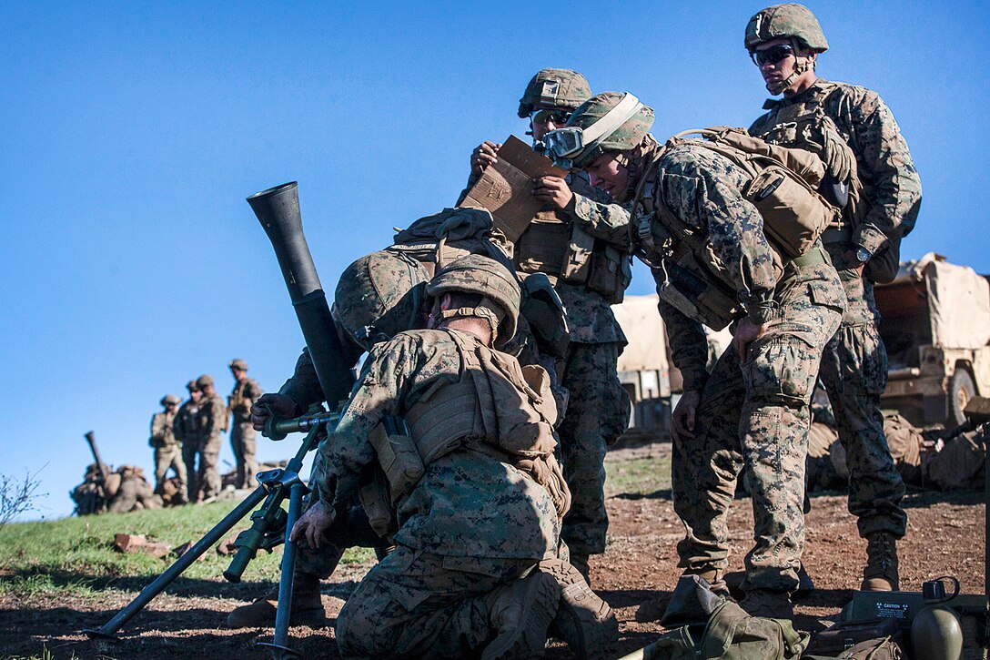 Marines adjust the sights on an 81 mm mortar as part of a live-fire exercise during Exercise Talisman Saber 17 at Townshend Island, Shoalwater Bay Training Area, Australia, July 21, 2017. The Marines are assigned to Weapons Company, Battalion Landing Team, 3rd Battalion, 5th Marines. Talisman Saber is a biennial exercise designed to improve the interoperability between Australian and U.S. forces. Marine Corps photo by Lance Cpl. Stormy Mendez