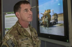 Command Sgt. Maj. William Thetford, the senior enlisted leader of U.S. Central Command, listens to a briefing during an Army-equipment tour Sep. 14, 2016 at Camp Arifjan, Kuwait. Thetford’s two-day visit to U.S. Army Central’s area of operations included briefings, meals with troops and tours of Army facilities. (U.S. Army photo by Sgt. Angela Lorden)
