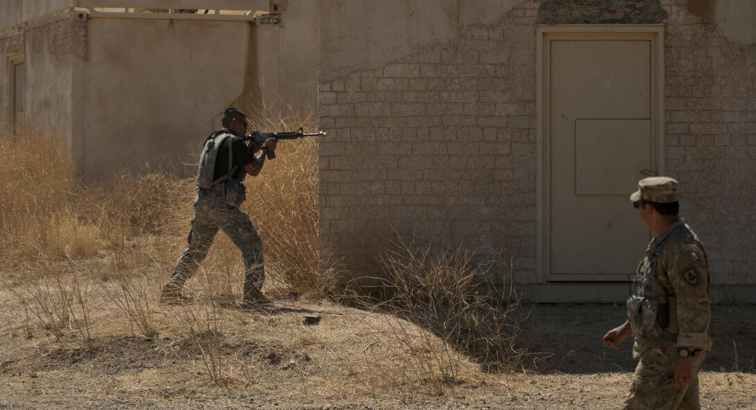 Army Reserve Sgt. Jc Pineda, a military police officer with the 96th Military Police Company, 96th Military Police Battalion, fires on a withdrawing column of U.S. Army Reserve Command vehicles while roleplaying as an enemy fighter during a training exercise at Niscoln, a small mock village on Fort Hunter Liggett, Calif., on July 20, 2017. The withdrawing Reserve Soldiers, members of the 344th Military Police Company, 485th Chemical Battalion, and 382nd Military Police Battalion, are training as part of CSTX 91-17-03. Nearly 5,400 service members from the U.S. Army Reserve Command, U.S. Army, Army National Guard, U.S. Navy, and Canadian Armed Forces are training at Fort Hunter Liggett as part of the 84th Training Command’s CSTX 91-17-03 and ARMEDCOM’s Global Medic; this is a unique training opportunity that allows U.S. Army Reserve units to train alongside their multi-component and joint partners as part of the America’s Army Reserve evolution into the most lethal Federal Reserve force in the history of the nation. (U.S. Army Reserve photo by Sgt. David L. Nye, 301st Public Affairs Detachment)