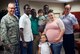 Family and friends gathered to witness a magical historical moment at the 932nd Airlift Wing, as Staff Sgt. Jamaine Smith (center, green shirt), crossed over 