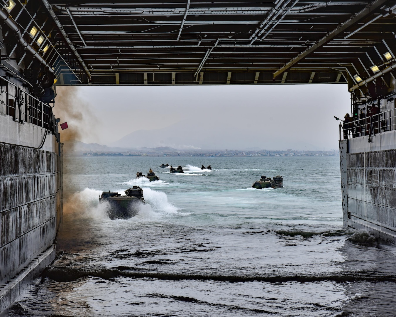 PACIFIC OCEAN - (Jul. 23, 2017)  -- U.S. Marine Corps Assault Amphibious Vehicles (AAV/P7-A1) depart the amphibious transport dock ship USS Somerset (LPD 25) in support of UNITAS LVIII. UNITAS is an annual, multi-national exercise that focuses on strengthening our existing regional partnerships and encourages establishing new relationships through the exchange of maritime mission-focused knowledge and expertise during multinational training operations.  (U.S. Navy Photo by Mass Communication Specialist 2nd Class Jacob I. Allison/RELEASED)