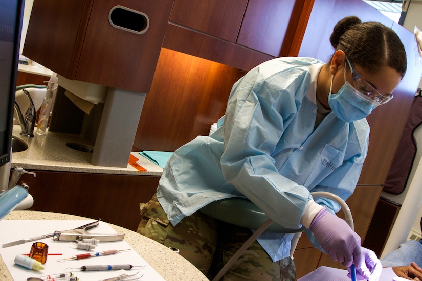 Spc. Cleopatra Matthews, a dental specialist with the 7239th Medical Support Unit, Chattanooga, Tennessee, provides dental care to local residents as part of the Fort Peck Innovative Readiness Training at Wolf Point, Montana, July 17, 2017. Matthews said the training is “valuable because we’re able to help and give back to people who need it.” The Army Reserve Medical Support Command is working with the Indian Health Service to provide medical and dental care to an estimated population of over 8,000 people. (U.S. Army Reserve photo by Spc. Claudia Rocha  345th Public Affairs Detachment)