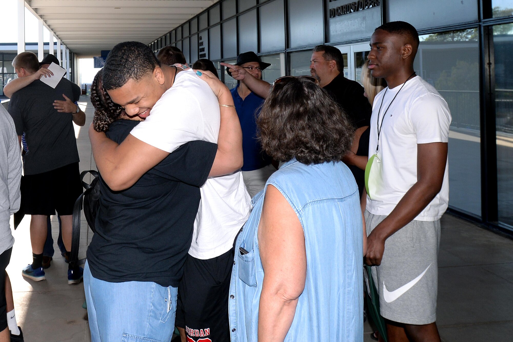 Parents and relatives said their goodbyes to their children before they reported to the U.S. Air Force Academy Preparatory School, July 19, 2017. (U.S. Air Force photo/Jason Gutierrez) 