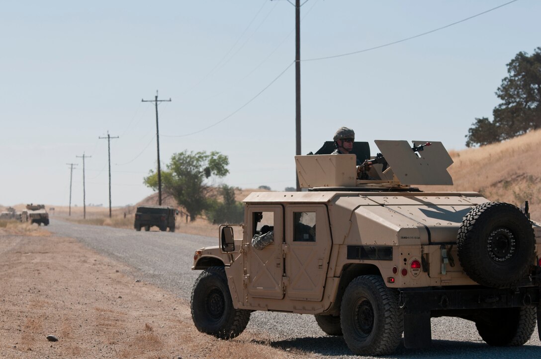 Army Reserve Soldiers in a convoy from the 949th Transportation Detachment (Movement Control Team) out of Boise, Idaho, preform a tactical halt during Combat Support Training Exercise 91-17-03 at Camp Roberts, Calif., on July 20, 2017. Nearly 5,400 service members from the U.S. Army Reserve, U.S. Army, Army National Guard, U.S. Navy, and Canadian Armed Forces are training at Fort Hunter Liggett, Calif., as part of the 84th Training Command’s CSTX 91-17-03 and ARMEDCOM’s Global Medic; this is a unique training opportunity that allows U.S. Army Reserve units to train alongside their multi-component and joint partners as part of the America’s Army Reserve evolution into the most lethal Federal Reserve force in the history of the nation. (U.S. Army Reserve photo by Sgt. Thomas Crough, 301st Public Affairs Detachment)