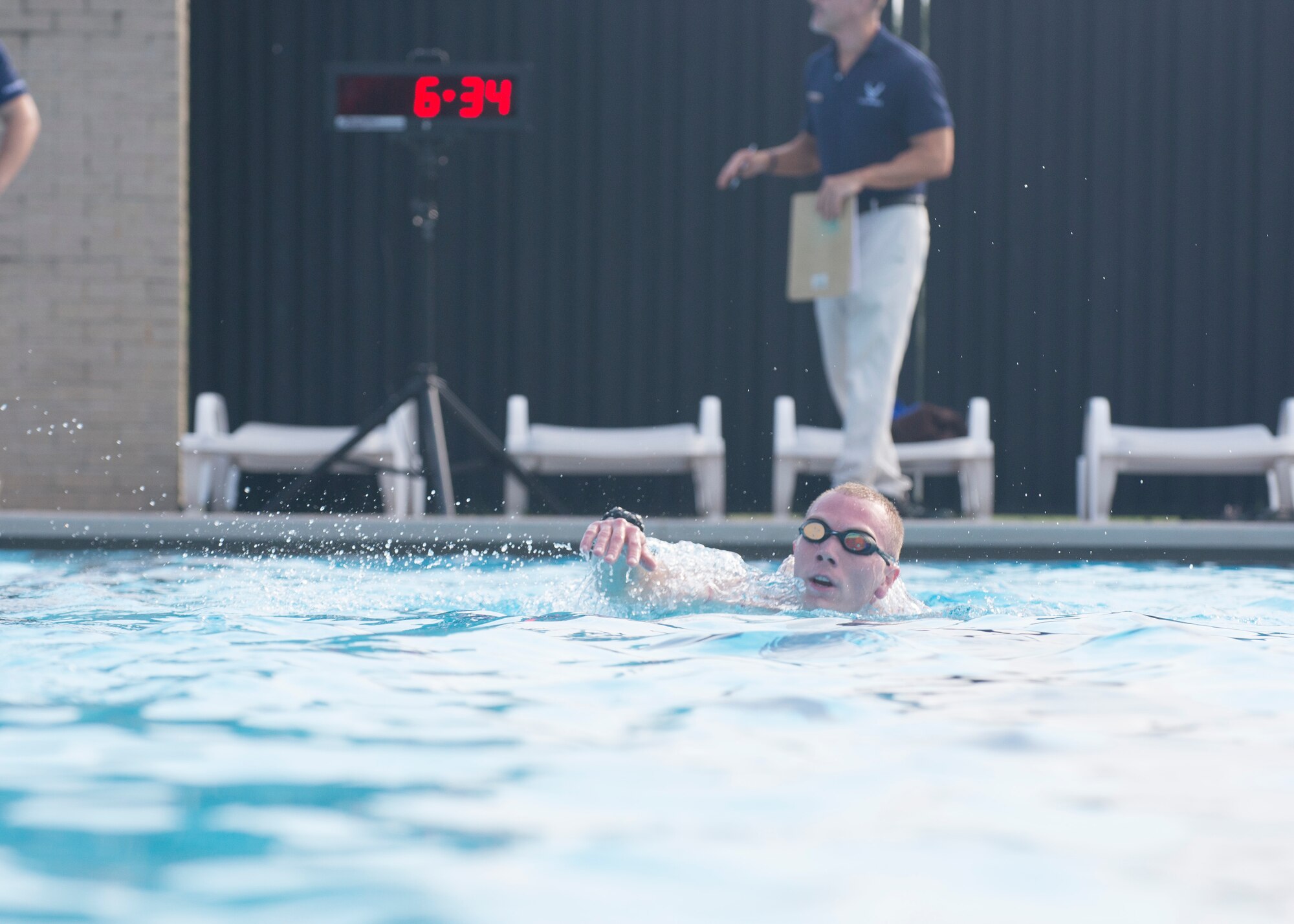 A Special Ops Challenge participant completes 10 laps during the 500-meter swim July 17, 2017, at the Oasis Pool on Dover Air Force Base, Del. Team Dover members entered the challenge consisting of five events that tested their speed and stamina. (U.S. Air Force photo/Staff Sgt. Jared Duhon)