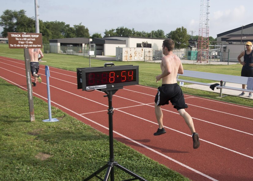Team Dover Airmen compete during the Special Ops Challenge 1.5-mile run July 17, 2017, at the base track on Dover Air Force Base, Del. Team Dover members entered the challenge consisting of five events that tested their speed and stamina. (U.S. Air Force photo/Staff Sgt. Jared Duhon)