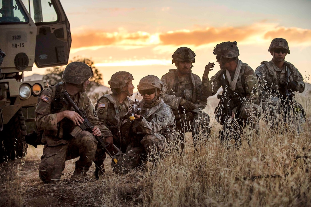 Army Reserve soldiers conduct a reconnaissance the night before a morning mission during a combat support training exercise at Fort Hunter Liggett, Calif., July 21, 2017. The soldiers are military police officers assigned to the 56th Military Police Company, the 382nd Military Police Battalion and the 344th Military Police Company. Army Reserve photo by Master Sgt. Michel Sauret