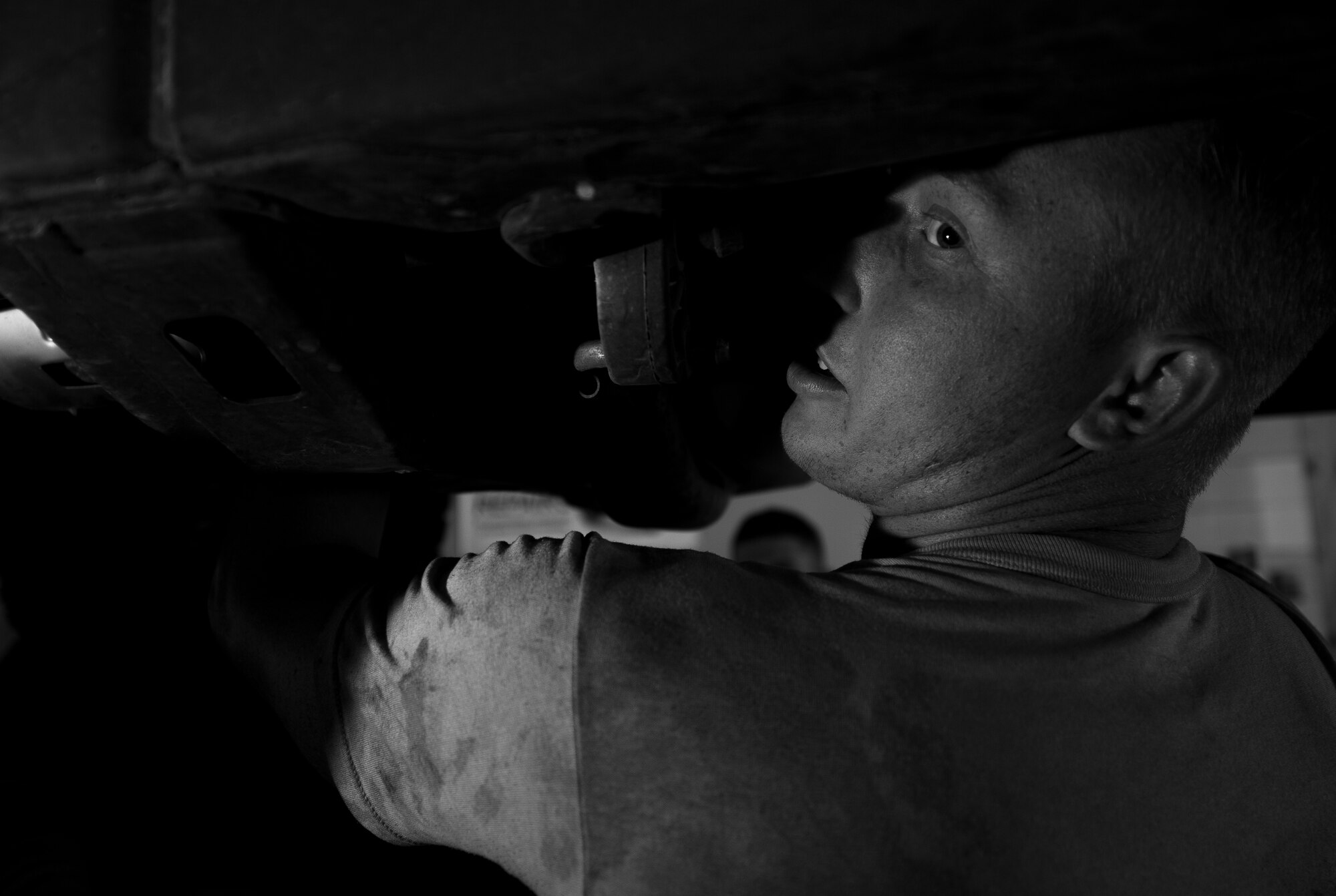 Senior Airman Brandon Morris, 27th Special Operations Logistics Readiness Squadron vehicle maintenance journeyman, repairs a truck at the auto skills center at Cannon Air Force Base, N.M., Jul. 13, 2017. . Airmen visiting the shop are supported with a large array of equipment, some of which are aging. The shop mainly works off hand-me-down equipment from other units and lives off a steady flow of Airmen. (U.S. Air Force photo by Senior Airman Lane T. Plummer)