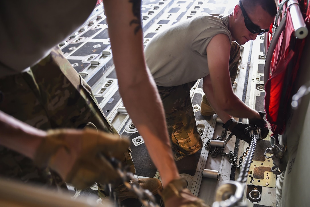 An Air Force crew prepares for an airdrop over East Africa, July 23, 2017. The airmen are  assigned to the 75th Expeditionary Airlift Squadron. Air Force photo by Tech. Sgt. Laura Beckley
