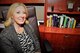 Alma Mohr, the 302nd Airlift Wing director of psychological health, poses for a photo at her desk, July 30, 2017, at Peterson Air Force Base, Colo. Mohr provides mental health services to Reserve Citizen Airmen either through short term problem solving sessions or, in cases when the reservists need long-term assistance. (U.S. Air Force photo/Staff Sgt. Frank Casciotta)