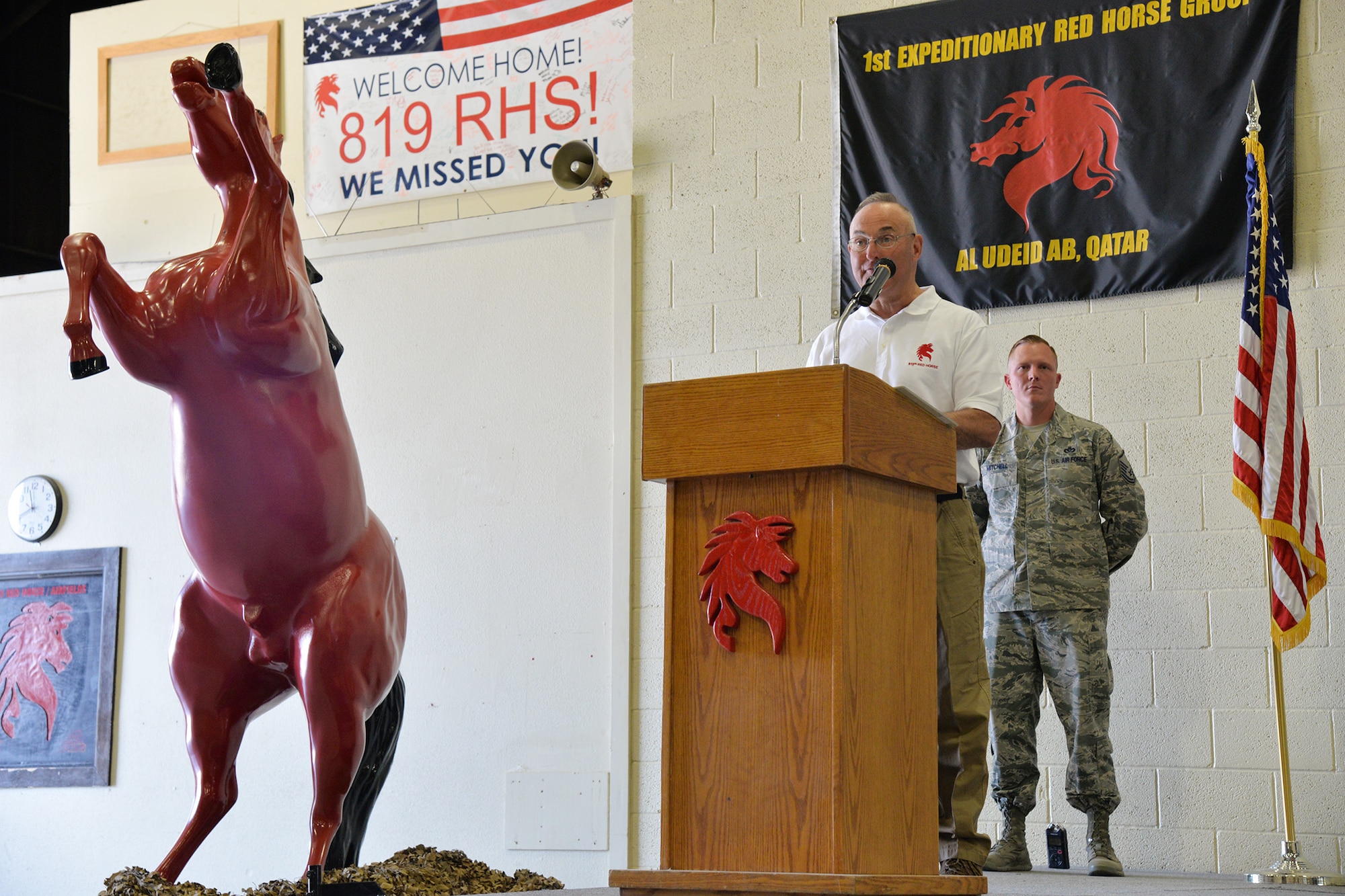 Retired Col. Gary Shick, first commander of the 219th RED HORSE Squadron, speaks during the 20th anniversary of the squadron’s activation July 20, 2017, at Malmstrom Air Force Base, Mont. Airmen from the 819th and 219th RHS celebrated their 20th anniversary since activation in 1997. (U.S. Air Force photo/Airman 1st Class Daniel Brosam)