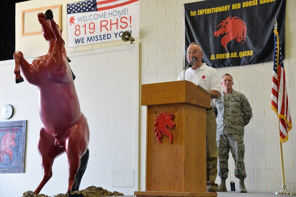 Retired Col. Gary Shick, first commander of the 219th RED HORSE Squadron, speaks during the 20th anniversary of the squadron’s activation July 20, 2017, at Malmstrom Air Force Base, Mont. Airmen from the 819th and 219th RHS celebrated their 20th anniversary since activation in 1997. (U.S. Air Force photo/Airman 1st Class Daniel Brosam)