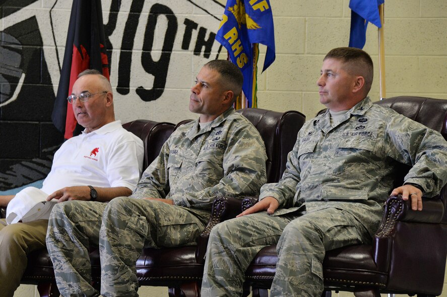 Retired Col. Gary Shick, left, first commander of the 219th RED HORSE Squadron, Col. Jose Rivera, 819th RED HORSE Squadron commander, center, and Col. Rusty Vaira, current 219th RHS commander, sit during the 20th anniversary of the squadrons’ activations July 20, 2017, at Malmstrom Air Force Base, Mont. The commanders each shared words with the audience in attendance and asked them to share their stories with one another. (U.S. Air Force photo/Airman 1st Class Daniel Brosam)