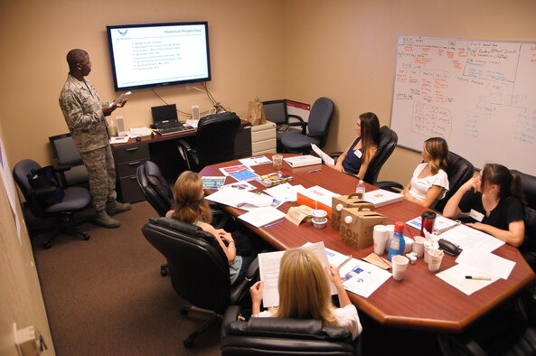 Tech. Sgt. Ralph Vandecruze, 944th Fighter Wing Airman and Family Readiness Center NCO-in-charge, conducts initial key spouse training July 9 at Luke Air Force Base, Arizona. Initial training provides key spouses with the tools, information and resources needed to effectively serve as a unit representative. (U.S. Air Force photo by Tech. Sgt. Nestor Cruz)